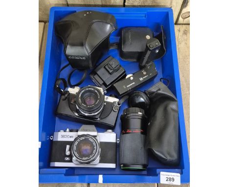 A Collection of Vintage Cameras &amp; lenses; Canon EX auto camera, Olympus OM10 camera &amp; other lenses.