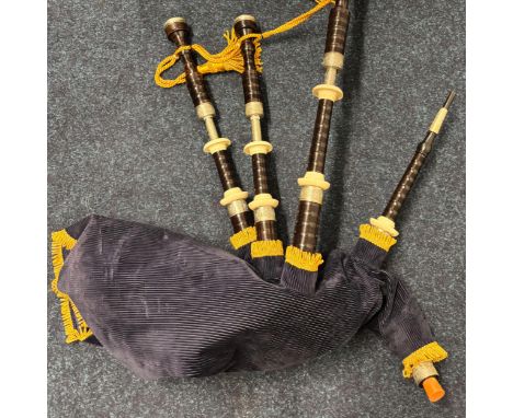 Boxed set of Scottish Bagpipes made from African Blackwood, faux ivory and Nickel silver. Possibly by Kintail.