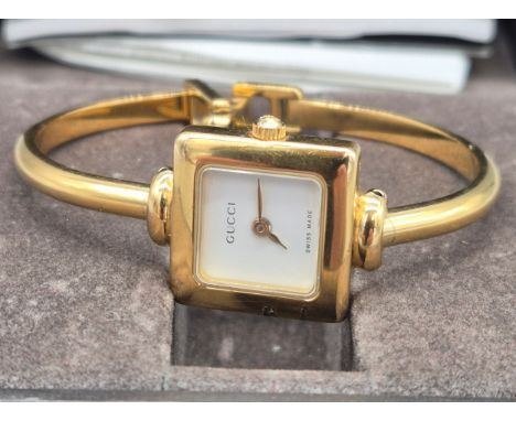 Gucci 1900L Gold plated wrist watch with box. 