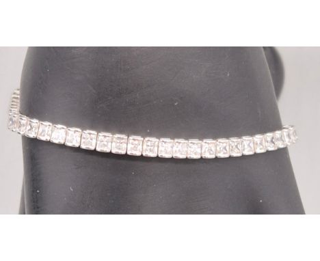 9ct white gold and CZ Stone tennis bracelet. 18cm length. 10.26grams. 
