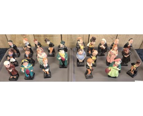 Two tray of Twenty Four Royal Doulton Dickens series figures; Oliver Twist, Fagen, Pecksniff, Pickwick, David Cooperfield, Fa