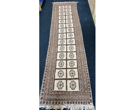 Large hand knotted wool runner rug. 405x102cm. 