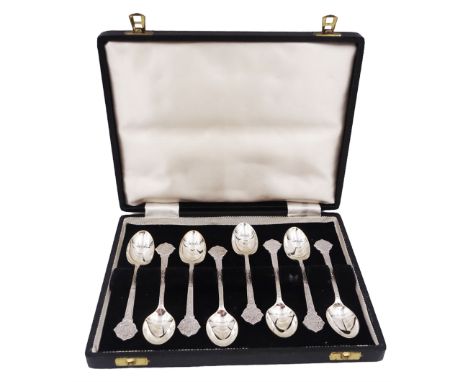 Set of eight modern silver teaspoons, each with cast Celtic style decoration, hallmarked Cooper Brothers & Sons Ltd, Sheffiel