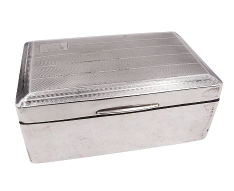 1920s silver mounted cigarette box, of rectangular form, with engine turned decoration to stepped hinged cover, opening to re