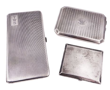 Three early 20th century silver cigarette cases, each with engine turned decoration and personal engravings, all hallmarked, 