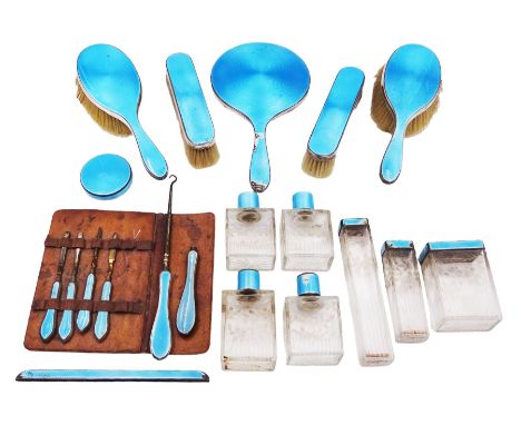 1920s silver mounted guilloche enamel dressing table set, comprising hand mirror, two hair brushes, two clothes brushes, comb