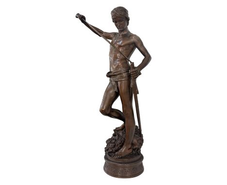 After Antonin Mercié (1845 - 1916)"David",  the stoic young Israelite shepherd David sheathing his sword as he stands over th