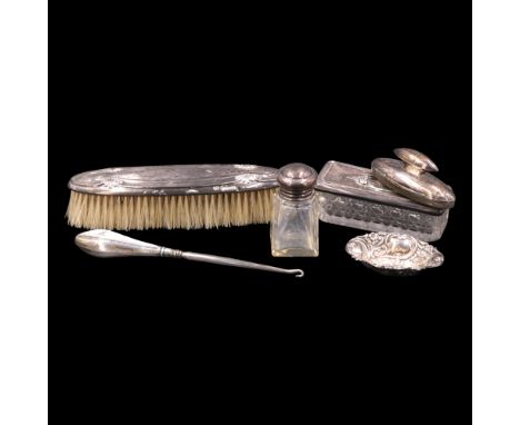 A small Victorian silver dish, together with a silver button hook, a nail buff, a hairbrush, a silver lidded toiletry jar and