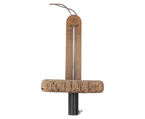 An early 20th Century Negretti &amp; Zambra floating kitchen or dairy thermometer, bearing a label with printed inscription "