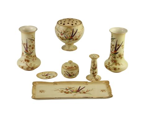 A group of early 20th Century Crown Ducal exotic bird ivory-ground wares including a pair of vases, a rose bowl, a tray, a ha