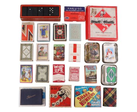 A collection of vintage cards and other games including Kan-u-Go, Monopoly, Shake Words and Shake Numbers
