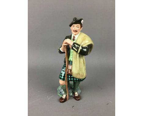 ROYAL DOULTON FIGURE OF 'THE LAIRD',along with a miniature copy of Beatrix Potter's cottage and two Nao figures (4)Condition 