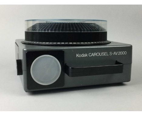 KODAK CAROUSEL S-AV2000 PROJECTOR,along with another projector and a tripod (3)
