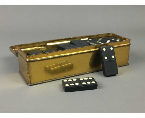 SET OF DOMINOES,along with a box with playing cards and a Bezique