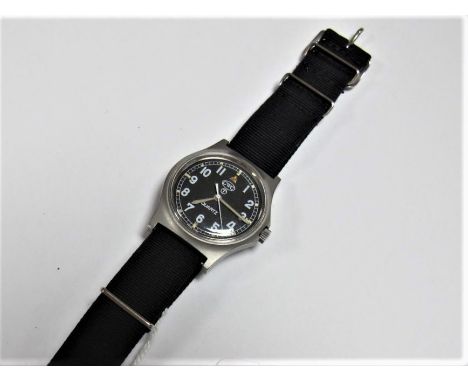 A Late XX Century C.W.C Wristwatch, with war department arrow, stamped WIO/6645-99, 5415317, 76076, 91. 
