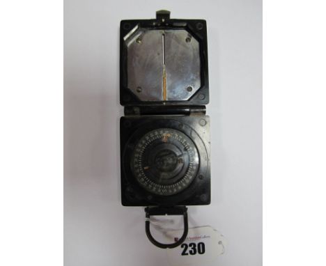 A Mid XX Century Mark I Compass, by T.G.Co with WD arrow. 