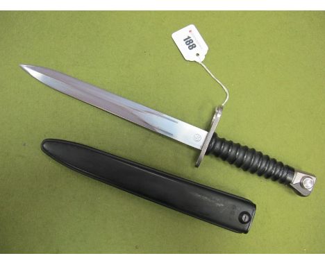 1957 Pattern Swiss "SIG" Bayonet, in its correct black scabbard. Excellent condition. Makers name F & W on blade.