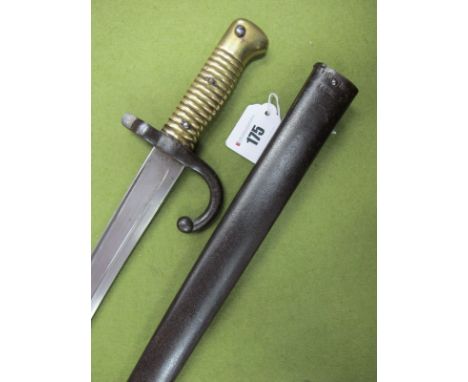 A French Chassepot Bayonet, mid XIX Century with brass hilt and metal scabbard, good condition. 