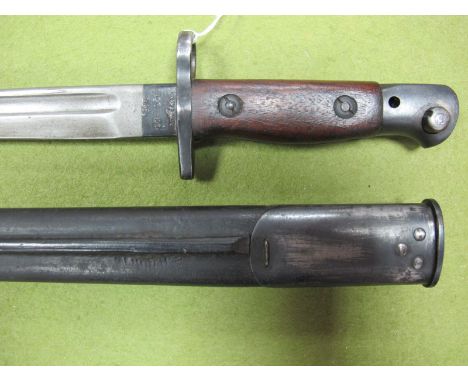 WWI British S.M.L.E Bayonet, dated 1907 by Sanderson, in its black leather scabbard, overall good condition. 