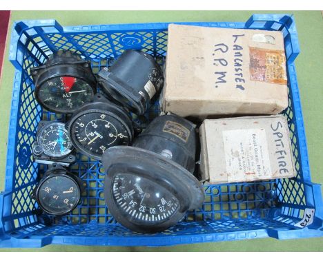A Collection of Eight British Military Aircraft Guages, Clock and Compass, including short and mason spitfire boost gauge mk.
