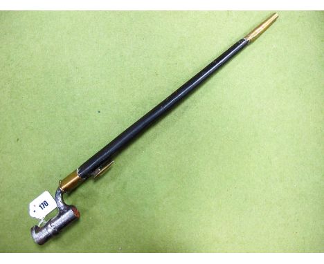 Victorian Martini Henry Socket Bayonet, in its leather scabbard, the hilt with rust pitting, blade the same. 