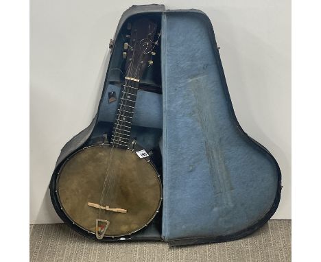 An old cased banjo.