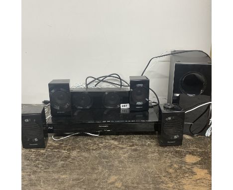 A vintage Panasonic CD player and speakers.