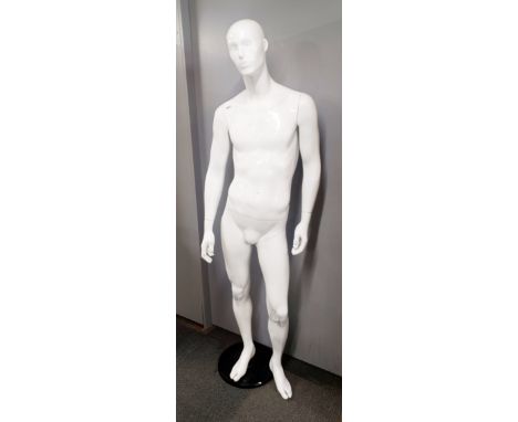 A full size mannequin on base, H. 192cm.