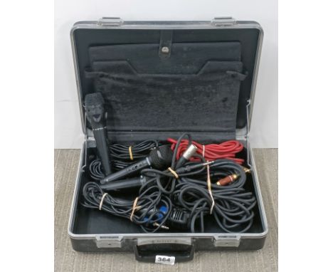 A group of four microphones and six mic leads, comprising of 2 Maxim MX13-18, a Unidirectional dynamic and a further micropho