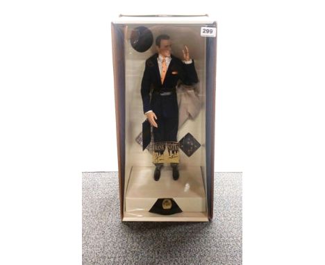 A boxed porcelain art Frank Sinatra doll.