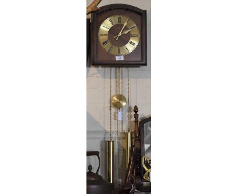 A Modern Wall Hanging Two Weight Wall Clock, Dial Inscribed JWS, 27cm wide 