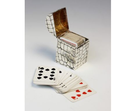 A late Victorian silver playing card box by Lawrence Emanuel, London 1899, of rectangular form with hinged domed cover and cr