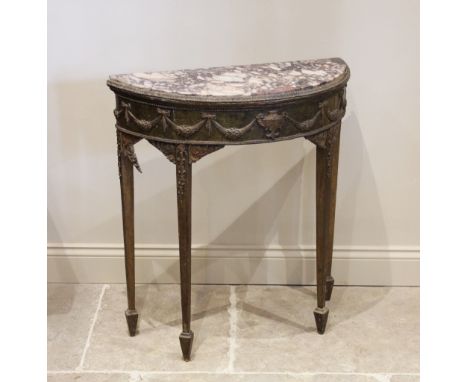 An Adam style giltwood and marble demi lune console table, the figured rouge marble top above a frieze moulded in relief with