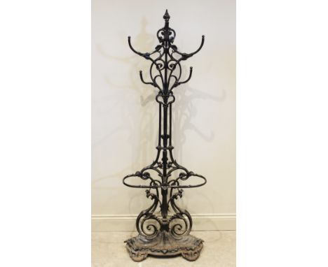 A Victoria Coalbrookdale style stick and coat stand, 19th century, the cast iron stand modelled as entwined foliate scrolls a