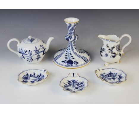A selection of Meissen Onion pattern porcelain, comprising; three shell shaped salts, 10.5cm long, a teapot and cover, 10cm h