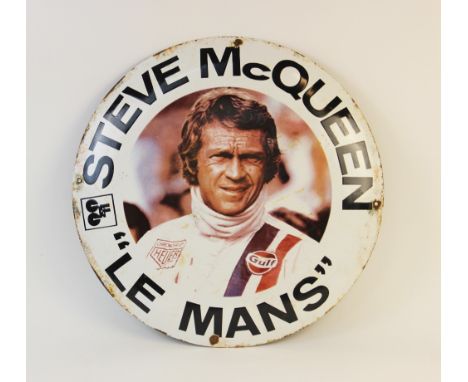 A vintage circular Steve McQueen 'Le Mans' enamel sign, mid 20th century, made to promote the 1971 'Le Mans' movie directed b