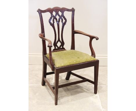 A 19th century Chippendale style mahogany child's elbow chair, the interlaced splat back extending to out swept arms with pap