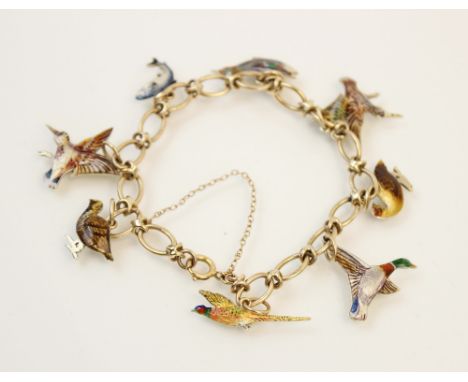 A 9ct gold enamelled charm bracelet by Cropp & Farr, Birmingham 1953, the oval link chain with spring ring and loop fastener,