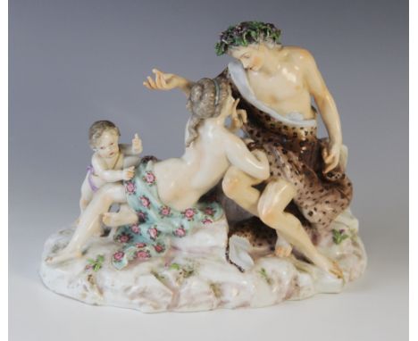A German porcelain figural group, possibly by Höchster Porzellan-Manufaktur, 19th century, modelled as a semi-draped courting