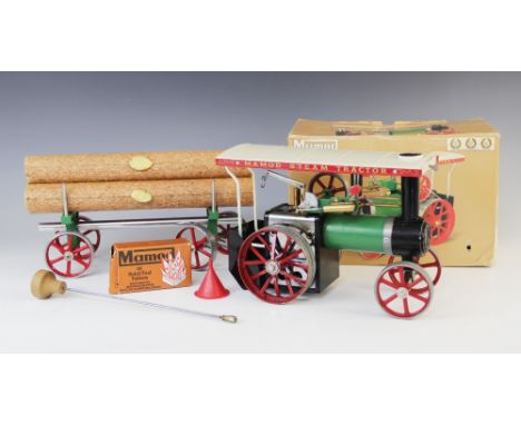 A boxed Mamod steam tractor engine, in typical green livery, with original cardboard box, box measures 19cm H x 28cm W x 15cm