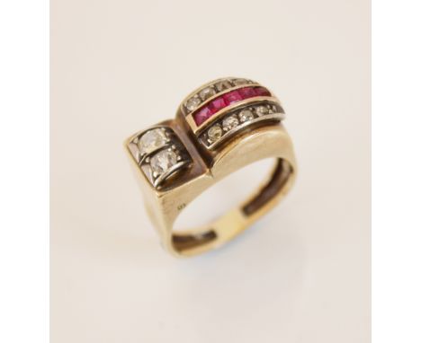 An Art Deco 'Odeonesque' diamond and ruby ring, the stylized head designed as a tapering arch set with calibre cut rubies and