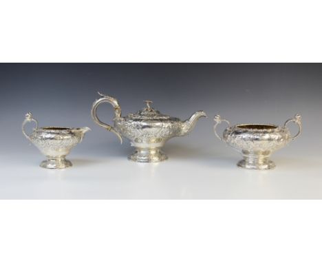 A William IV three-piece silver tea service by John Wakefield, London 1832, comprising teapot, sugar bowl and milk jug, each 