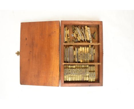 A box of vintage Bovine / agricultural animal tattoo, letters and numbers. A wide selection in a period wooden box. A useful 