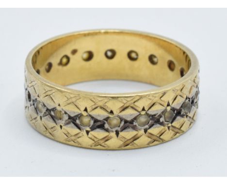 18ct gold eternity ring, 4.1 grams, size L (some stones missing).  