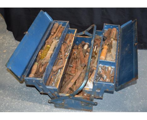 Blue cantilever tool box with a number of vintage tools; spanners, chisels, hammers, etc,. In need of clean/refurbishment.  