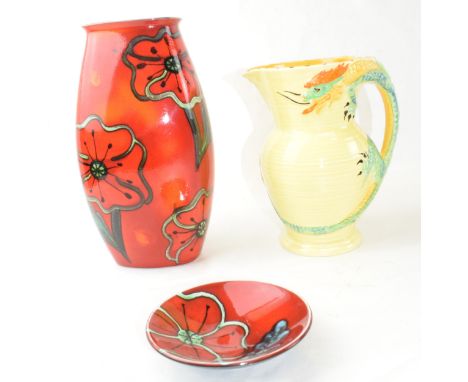 A Poole Pottery vase together with Poole pin tray and a Burleigh Ware dragon handled vase. (3)  No chips, breaks or restorati