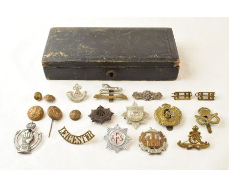 A good collection of Military Cap badges together with a WWII era RAC (Royal Automobile Club) cap badge. Of note are a Leices