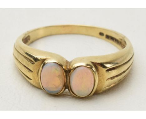 9ct gold ring set with 2 opals, 3.3 grams, size S/T.  