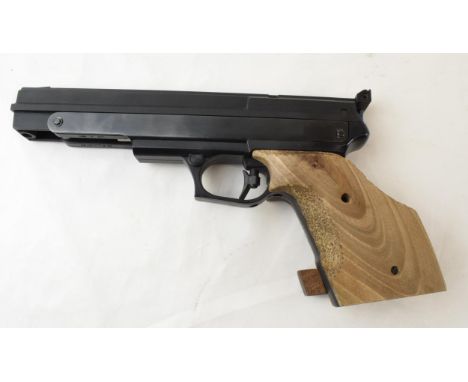 A Gamo 'Compact' Single Stroke pneumatic .177 target air pistol. Adjustable sights, trigger and adjustable anatomical hardwoo