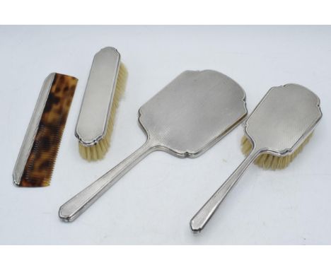 Hallmarked silver 4 piece dressing table set, Walker and Hall, Birmingham 1965, to include a mirror, a hair brush, a brush an